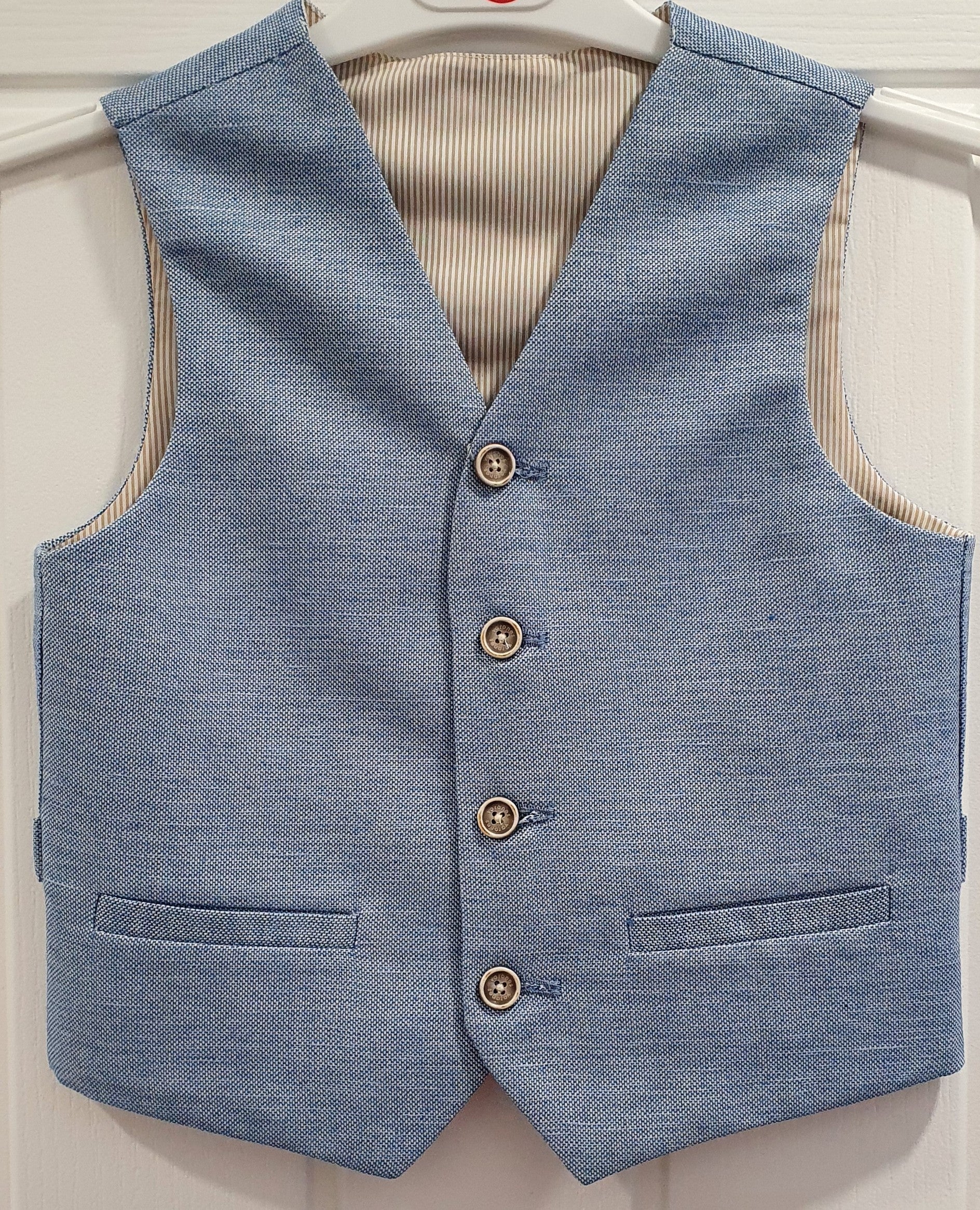 One Varones Boys Pale Blue Waistcoat:-10-10018 70